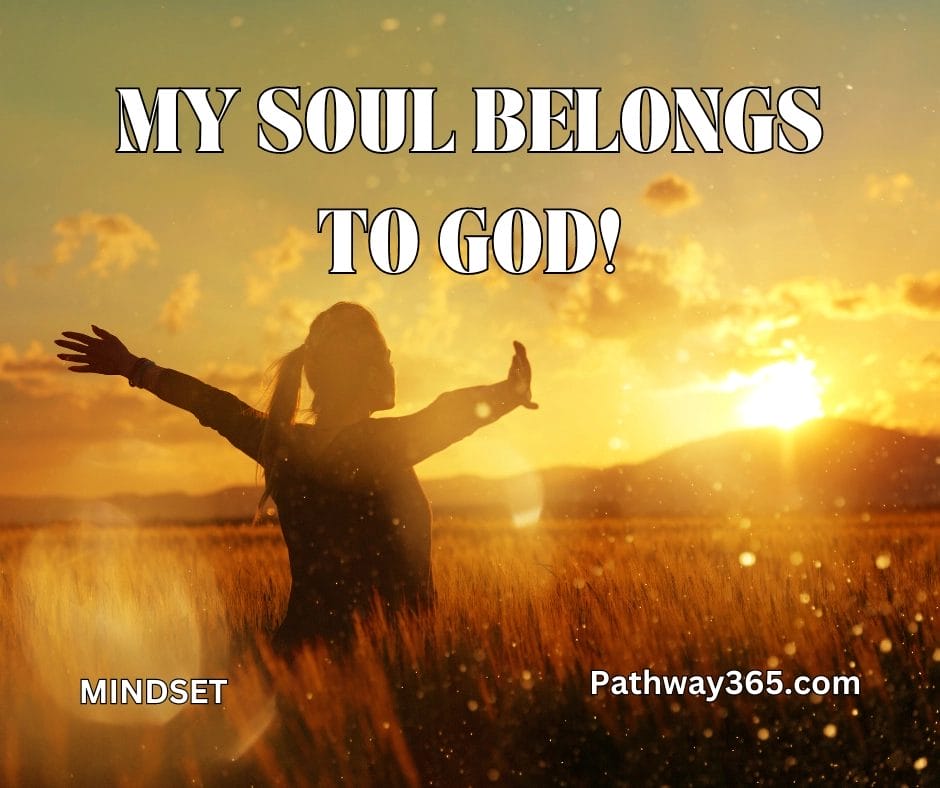 “A woman standing in a golden field at sunset with arms raised toward the sky, symbolizing surrender and worship. Text reads: ‘My Soul Belongs to God!’”