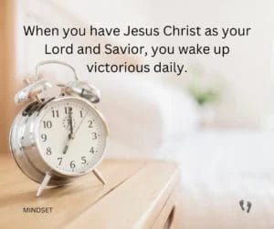 a silver alarm clock on a table