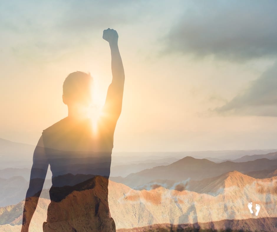 a man raising his fist in the air