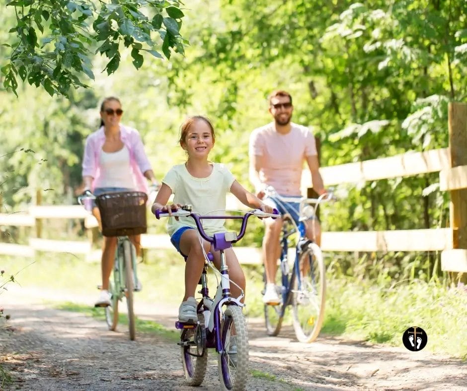 Family Bible Quiz cover image showing a family riding bicycles together, representing unity, joy, and a God-centered family life